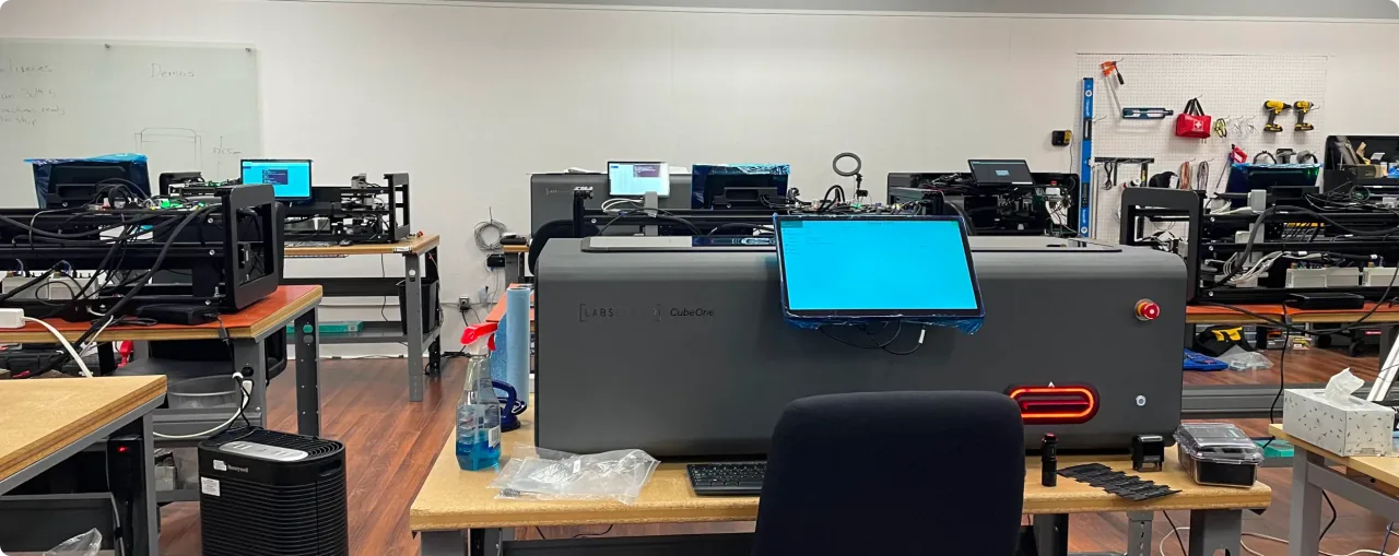 LabsCubed CubeOne automated rubber tensile testing machine in its shipping packaging, ready for delivery.
